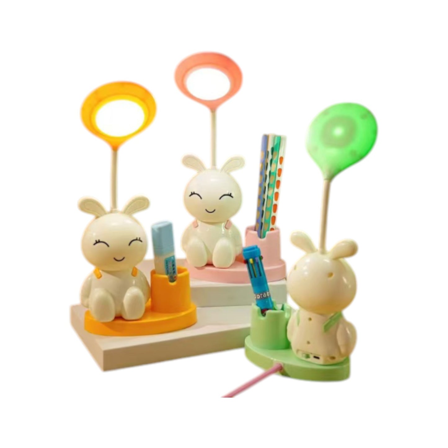 A Desk Lamp, With A Pen Holder, And A Light-Up Toy
