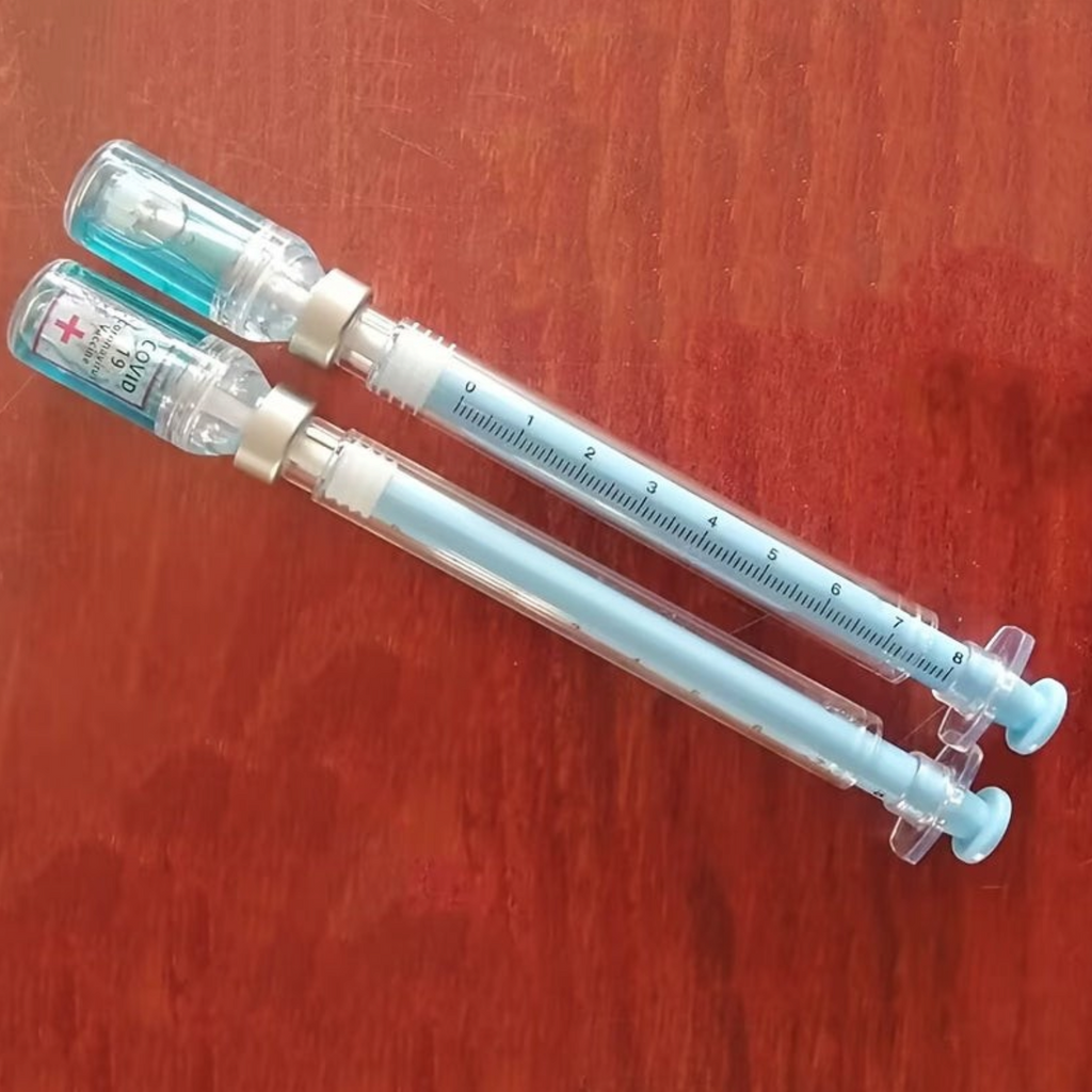 Elite Stationery House medical vaccine themed pens shaped like syringes with blue ink and measurement markings