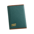 Elite Stationery House 2027 executive diary in teal green with brown stitched trim and gold lettering on a desk