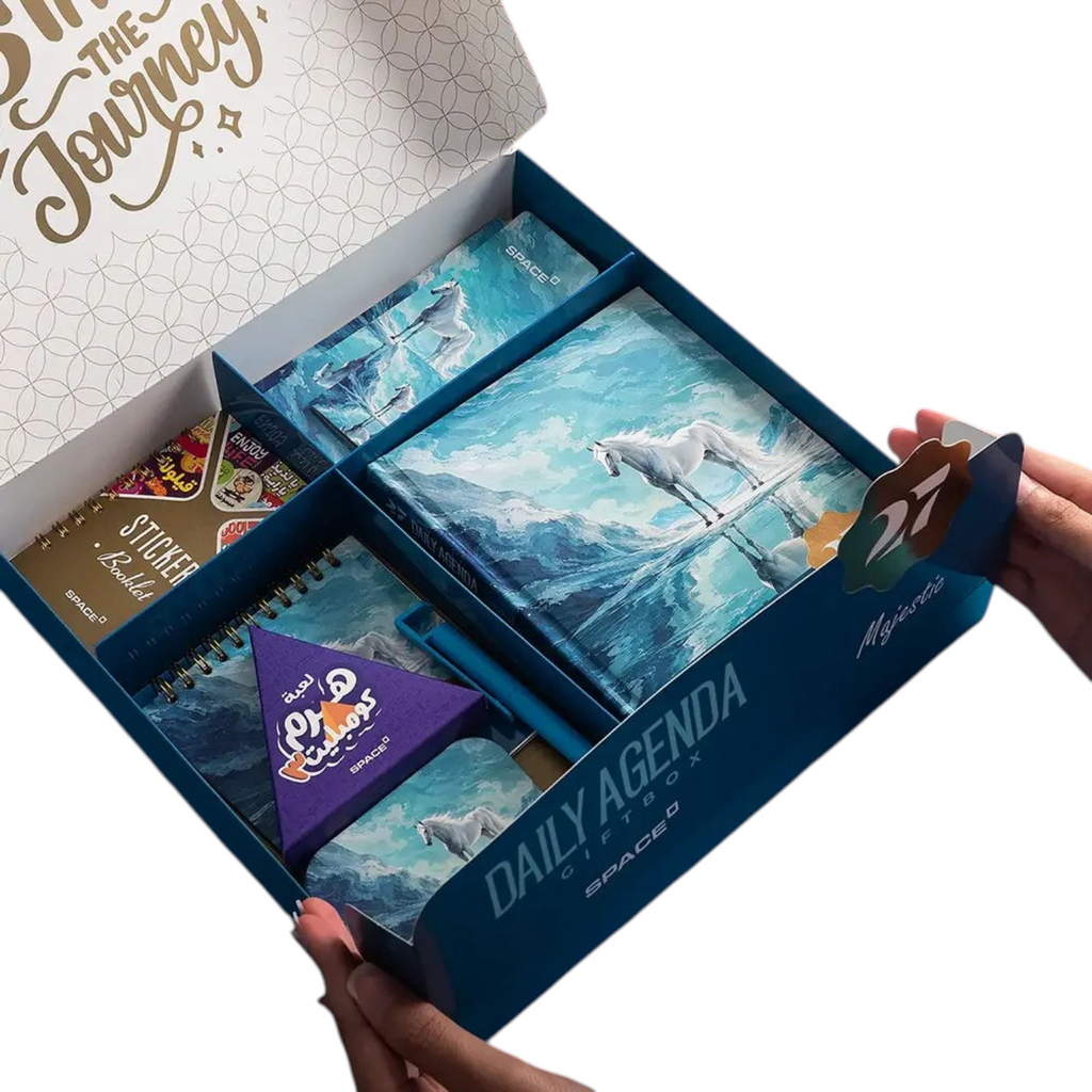 Elite Stationery House 2027 Majestic gift box containing a daily agenda, sticker booklet, pen, and desk accessories.