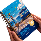 Elite Stationery House 2027 daily agenda with a blue tram illustration on a hard cover and gold wire binding