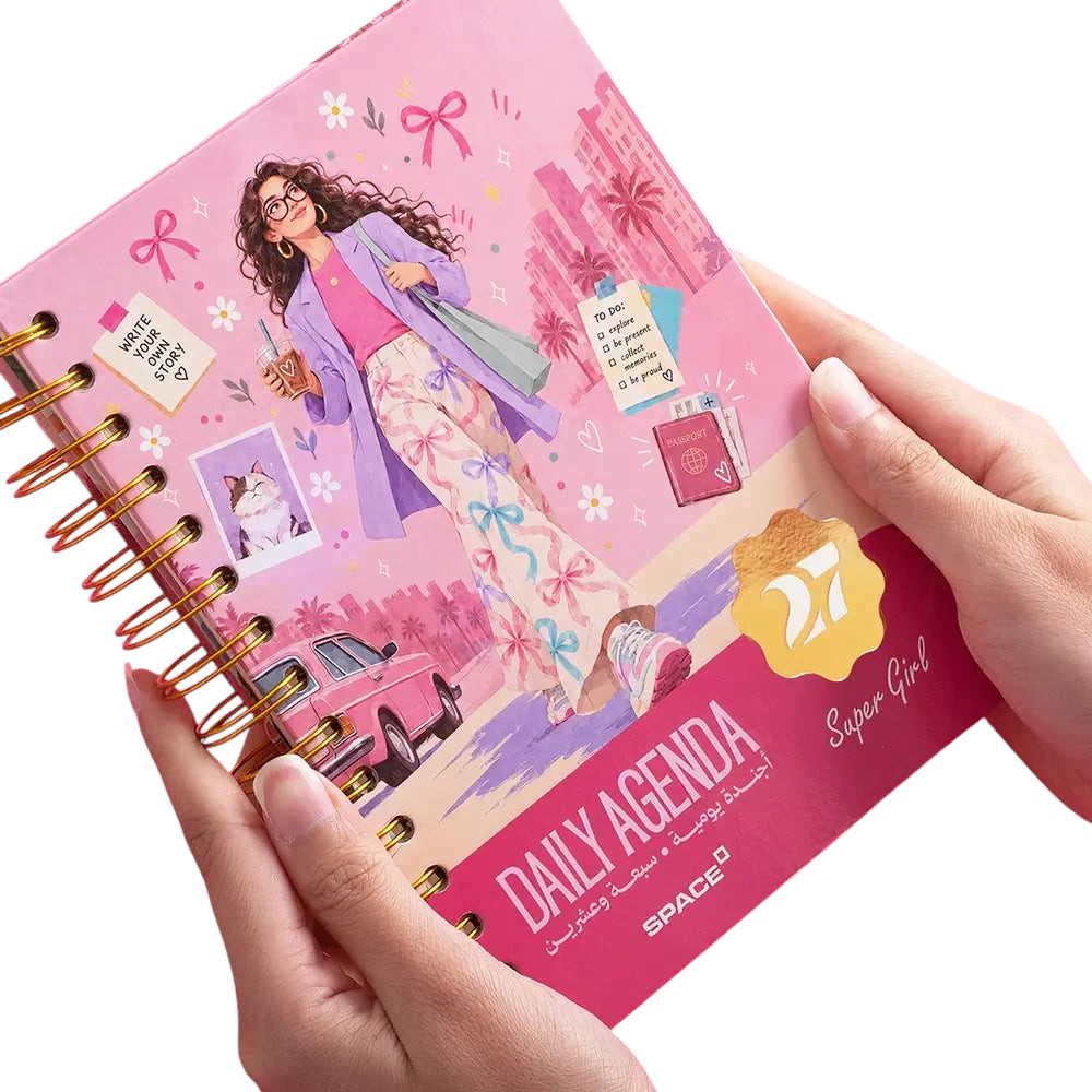 Elite Stationery House 2027 Super Girl daily agenda with pink hard cover, wire binding, and cream paper pages.