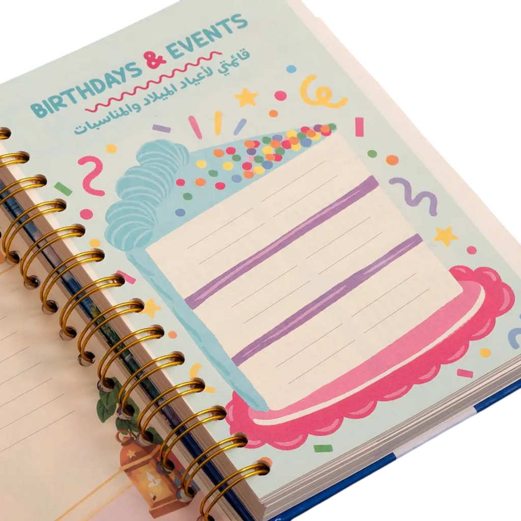Elite Stationery House 2027 daily agenda featuring a colorful birthday cake illustration on a wire-bound cream page