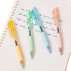 Elite Stationery House set of four pastel-colored retractable ballpoint pens with 0.7mm tips on a spiral notebook