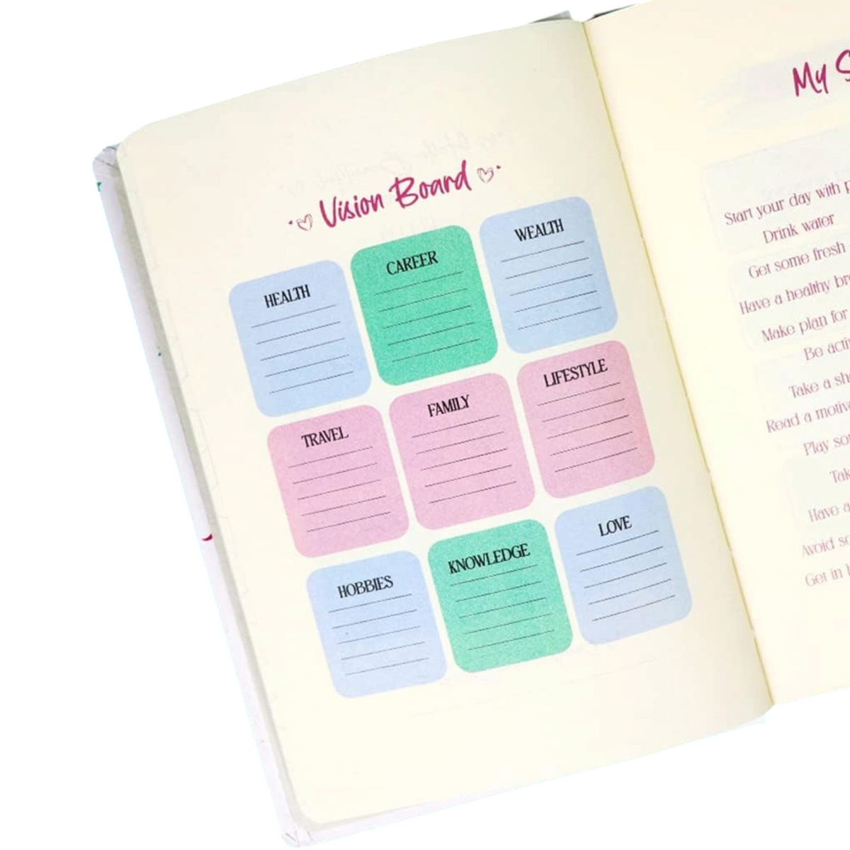 Elite Stationery House A5 cream paper notebook with a vision board page featuring colorful pastel boxes