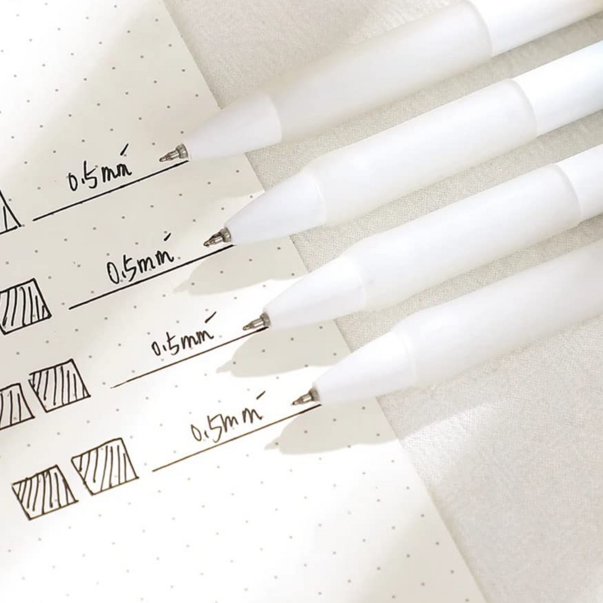 4 Premium Gel Ink Pens Featuring a 0.5 mm Needle Tip.