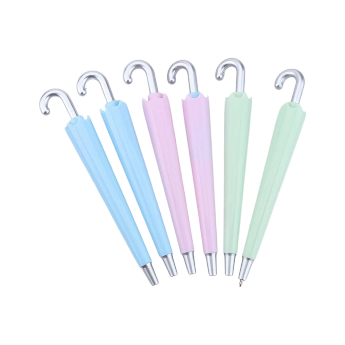 Elite Stationery House umbrella shaped retractable ballpoint pens in pastel blue, pink, and green on white fur.