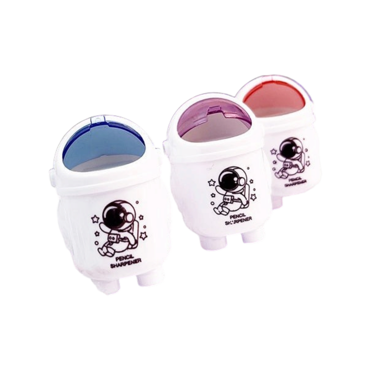 Elite Stationery House astronaut-themed pencil sharpeners in white with cute space illustrations on a wooden table.