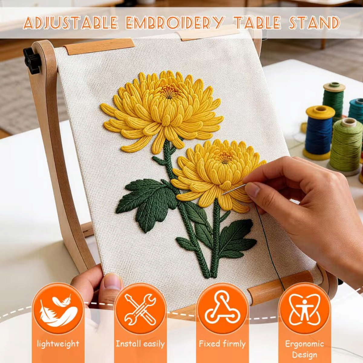 Elite Stationery House adjustable wooden embroidery table stand holding a fabric panel with yellow chrysanthemum art.