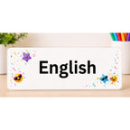 Elite Stationery House English subject label with colorful emoji, star, and confetti designs on a white background.