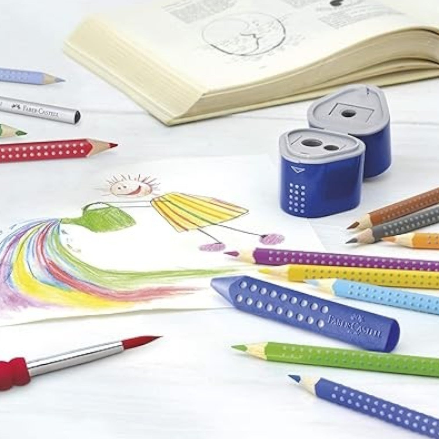 Elite Stationery House Faber-Castell Grip color pencils in a metal tin with a sharpener and a child's drawing