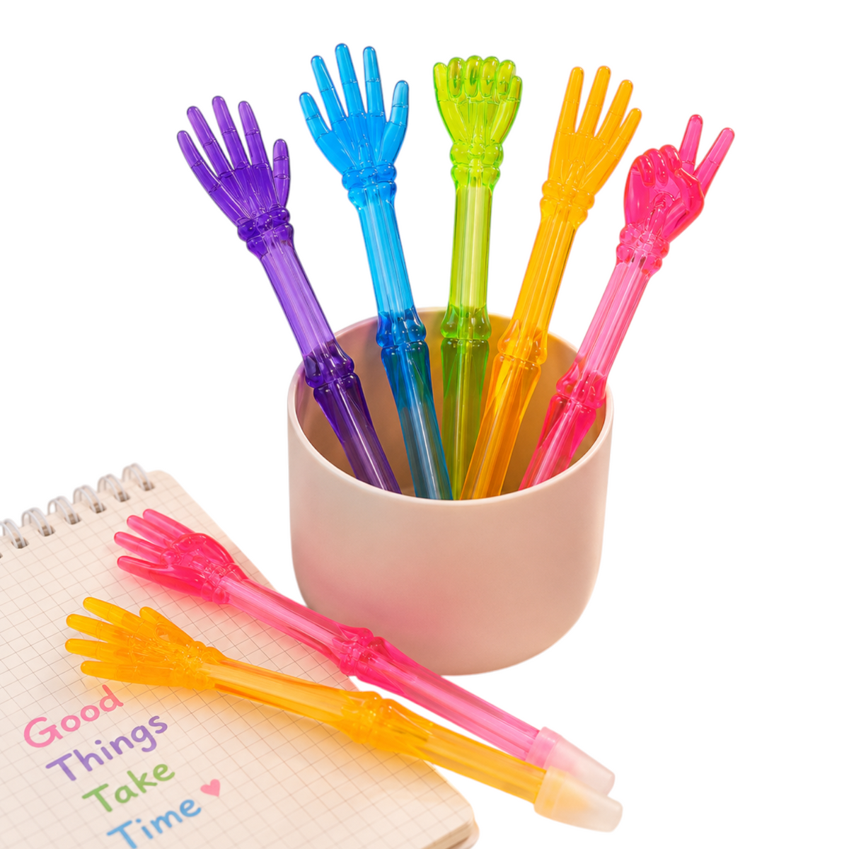 Elite Stationery House skeleton hand gel pens in assorted neon colors with open hand, fist, and peace sign designs.