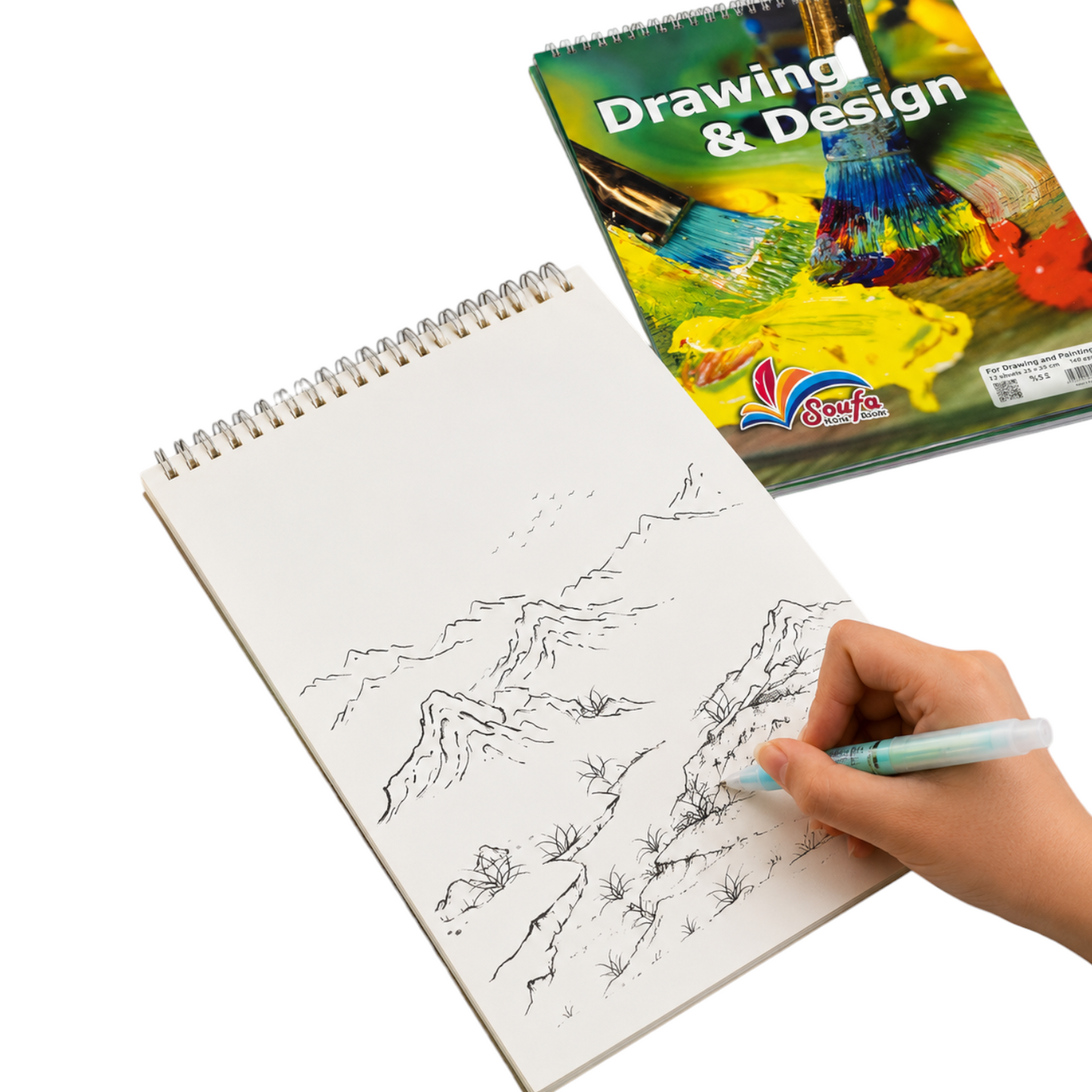 Elite Stationery House spiral-bound white sketchbook with a hand drawing a landscape scene with a fine-liner pen