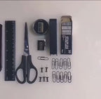 A movable Plastic Desk Organizer - Comes With Various Tools